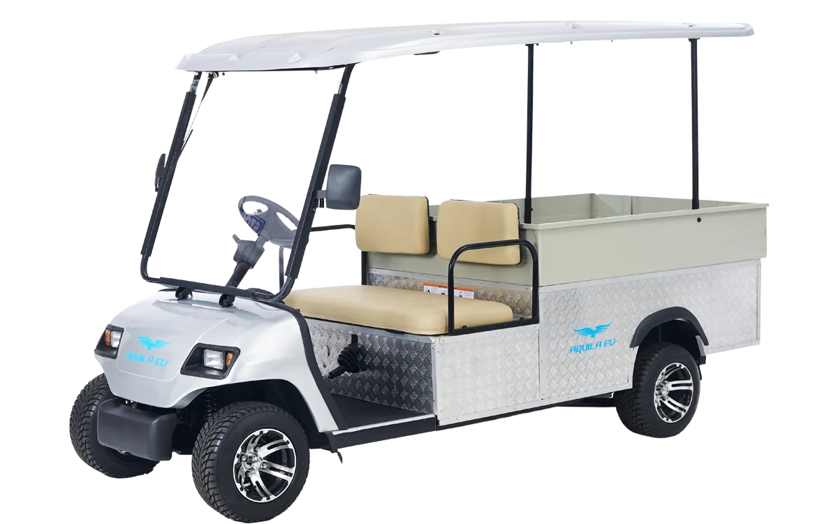 A white electric utility golf cart with a cargo bed, designed for transporting goods and passengers, equipped with a roof and striped background.